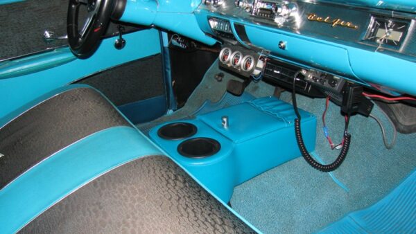 A Low Rider Floor Cup Holder in a 1957 Chevy
