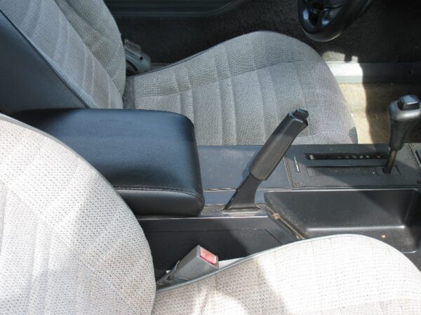 A 1982-1992 Camaro Replacement Armrest Lid in a Camaro
